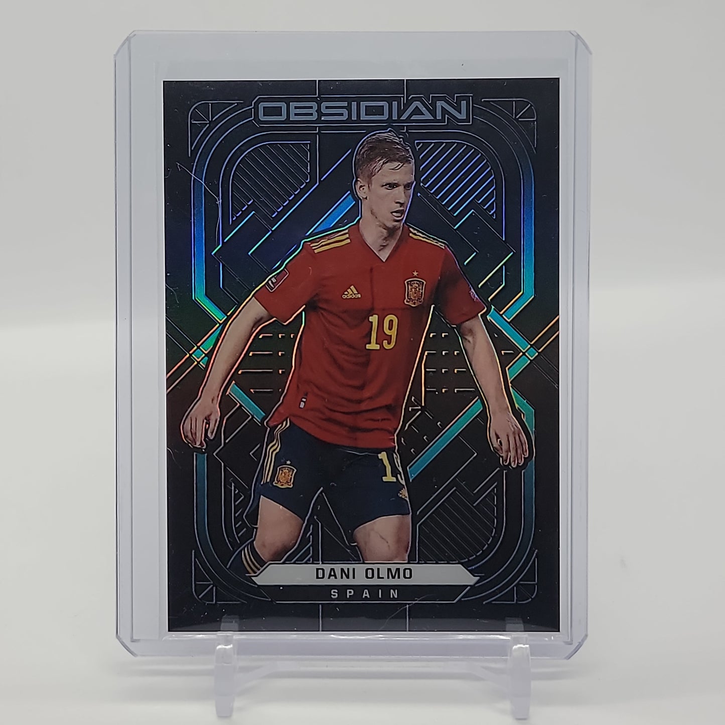 Dani Olmo Electric Neon Blue Flood /12 Base Obsidian Card No. 31